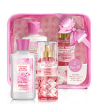 Bath & Body Works Japanese Cherry Blossom gift set with bottles and a pink carrying case.