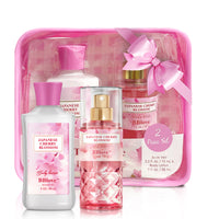 Bath & Body Works Japanese Cherry Blossom gift set with bottles and a pink carrying case.